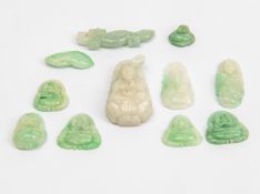 A GROUP OF ELEVEN CARVED JADE PIECES
