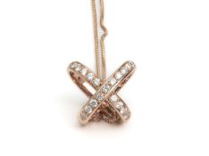 A DIAMOND CROSSOVER PENDANT ON ADJUSTABLE CHAIN