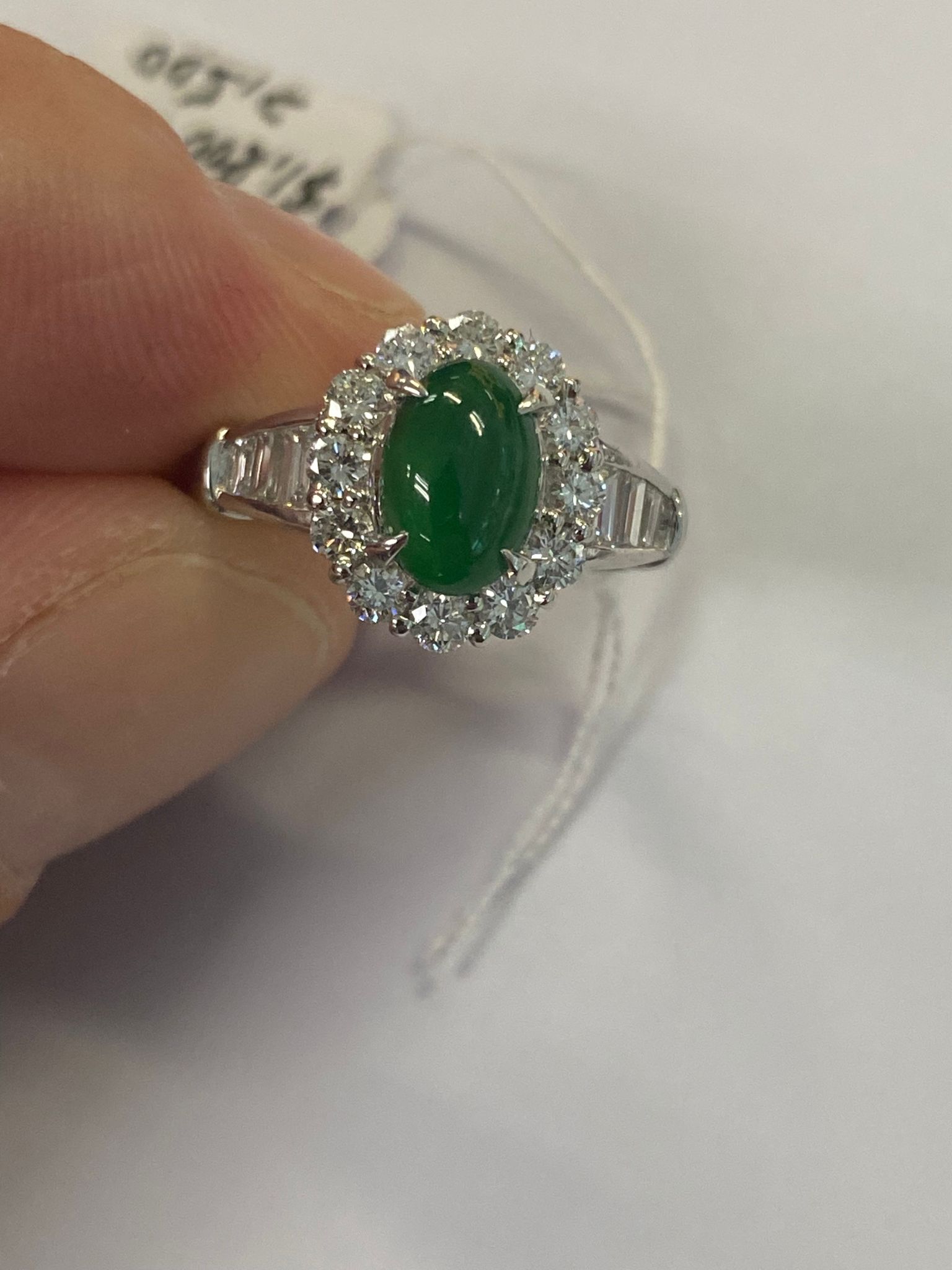 A JADEITE AND DIAMOND CLUSTER RING - Image 11 of 11