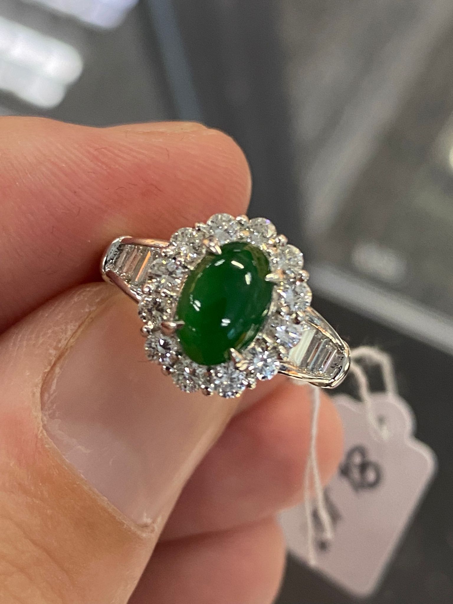 A JADEITE AND DIAMOND CLUSTER RING - Image 10 of 11