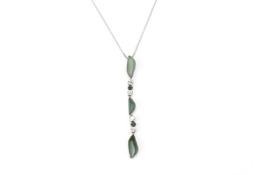 A JADE AND DIAMOND PENDANT ON CHAIN