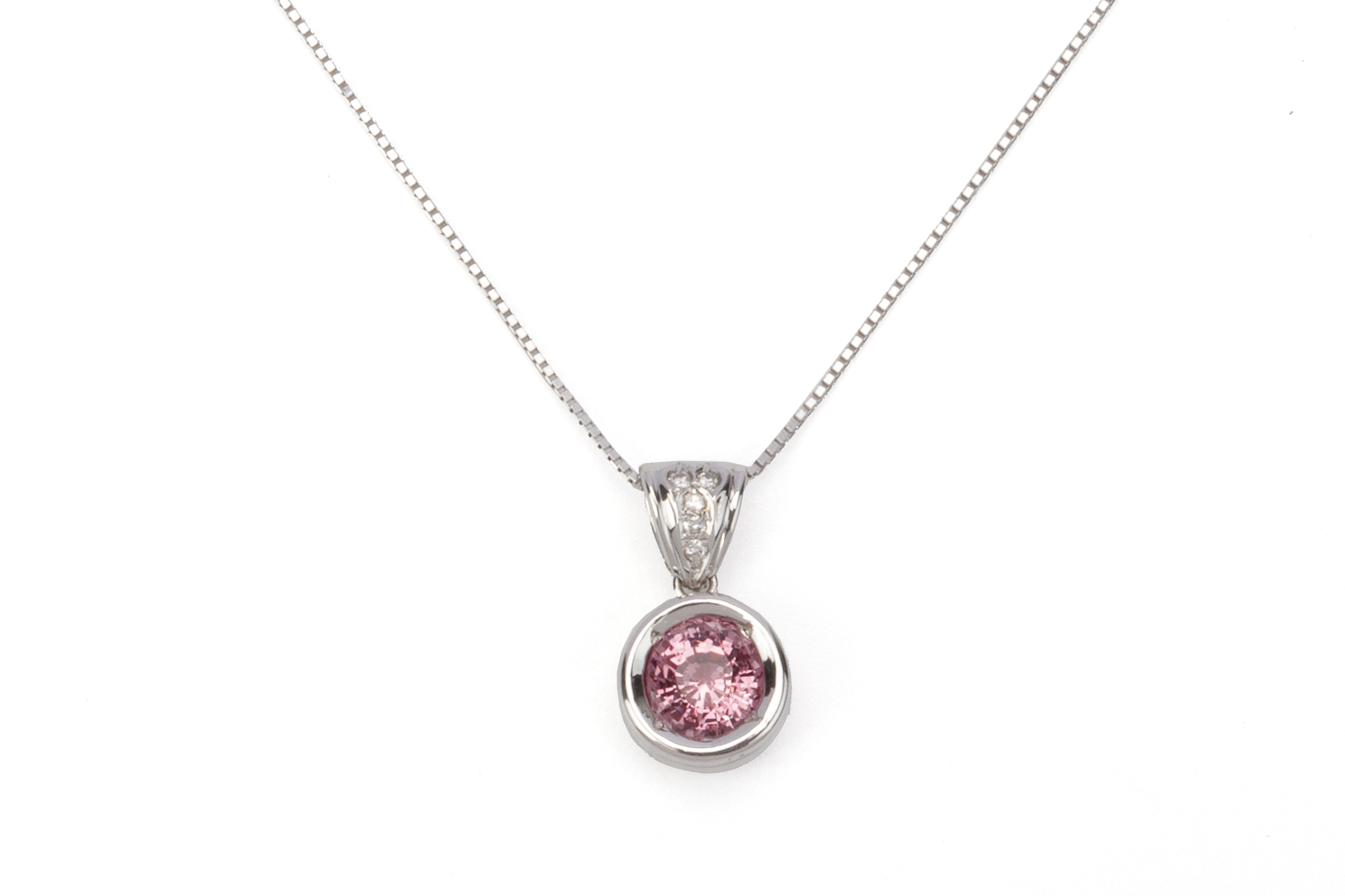A PINK SPINEL AND DIAMOND PENDANT ON CHAIN