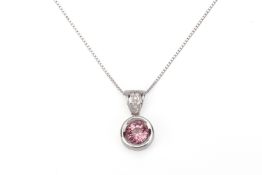 A PINK SPINEL AND DIAMOND PENDANT ON CHAIN