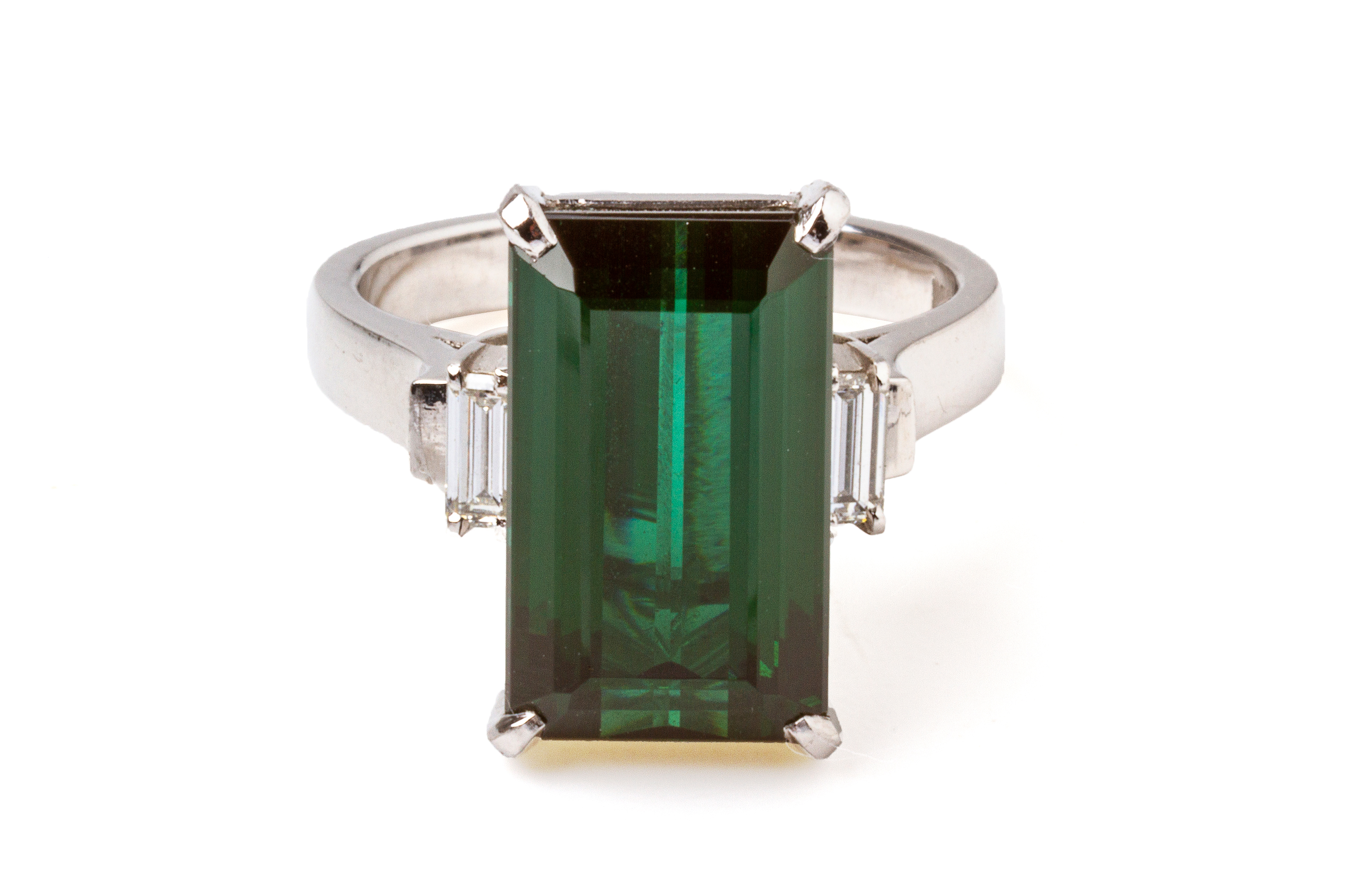 A GREEN TOURMALINE AND DIAMOND RING