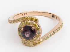 A BROWN SAPPHIRE AND YELLOW DIAMOND RING