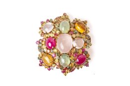 A MULTI GEM SILVER GILT PENDANT BROOCH