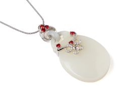 A WHITE JADE, SAPPHIRE AND DIAMOND PENDANT WITH CHAIN