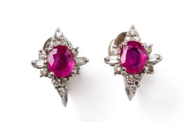 A PAIR OF RUBY AND DIAMOND SCREWBACK EARRINGS