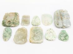A GROUP OF ASSORTED CARVED JADE ITEMS