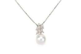 A CULTURED PEARL AND GEM SET PENDANT ON CHAIN