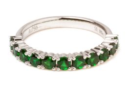 A TSAVORITE HALF ETERNITY RING