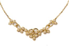 A GOLD & DIAMOND NECKLACE