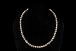 AN AKOYA CULTURED PEARL SINGLE STRAND NECKLACE