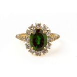 A CHROME DIOPSIDE AND DIAMOND CLUSTER RING