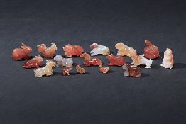 A GROUP OF MINIATURE CARVED HARDSTONE ZODIAC ANIMALS