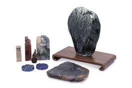 A GROUP OF ORIENTAL STONE OBJECTS AND SEALS