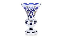 A BOHEMIAN WHITE OVERLAY AND BLUE FLASHED GLASS VASE