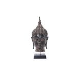 A SOUTHEAST ASIAN BRONZE BUDDHA HEAD