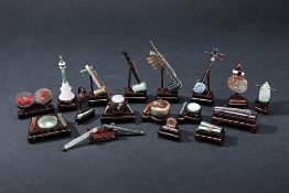 A GROUP OF MINIATURE HARDSTONE CHINESE MUSICAL INSTRUMENTS