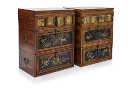 A PAIR OF ORIENTAL CARVED SECTIONAL STACKING CHESTS