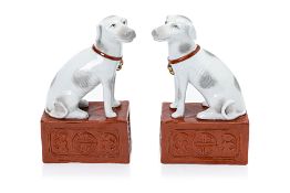 A PAIR OF CHINESE PORCELAIN MODELS OF DOGS