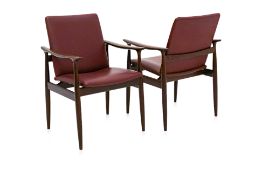 A PAIR OF MID-CENTURY ROSEWOOD ARMCHAIRS
