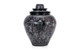 A SOUTHEAST ASIAN BLACK LACQUER JAR AND COVER