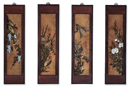 A SET OF FOUR ORIENTAL POLYCHROME CARVED WOOD WALL PANELS