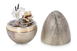 A STUART DEVLIN SILVER SURPRISE EGG