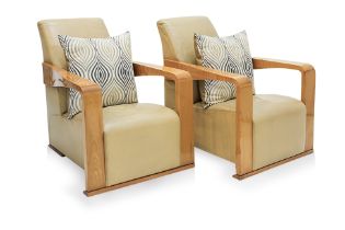 A PAIR OF HUGUES CHEVALIER 'YING' ARMCHAIRS AND A SIDE TABLE