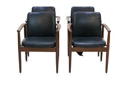 A SET OF FOUR MID-CENTURY ROSEWOOD ARMCHAIRS