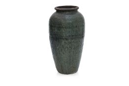 A VERY LARGE GREEN GLAZED CERAMIC POT