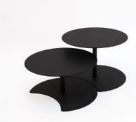 A PAIR OF OUTDOOR BLACK METAL NESTING COFFEE TABLES