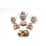 A CHINESE FAMILLE ROSE COFFEE SERVICE AND TEA SERVICE