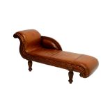 AN ANTIQUE SWEDISH LEATHER UPHOLSTERED WALNUT CHAISE LONGUE