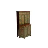 A TIBETAN POLYCHROME DECORATED CABINET
