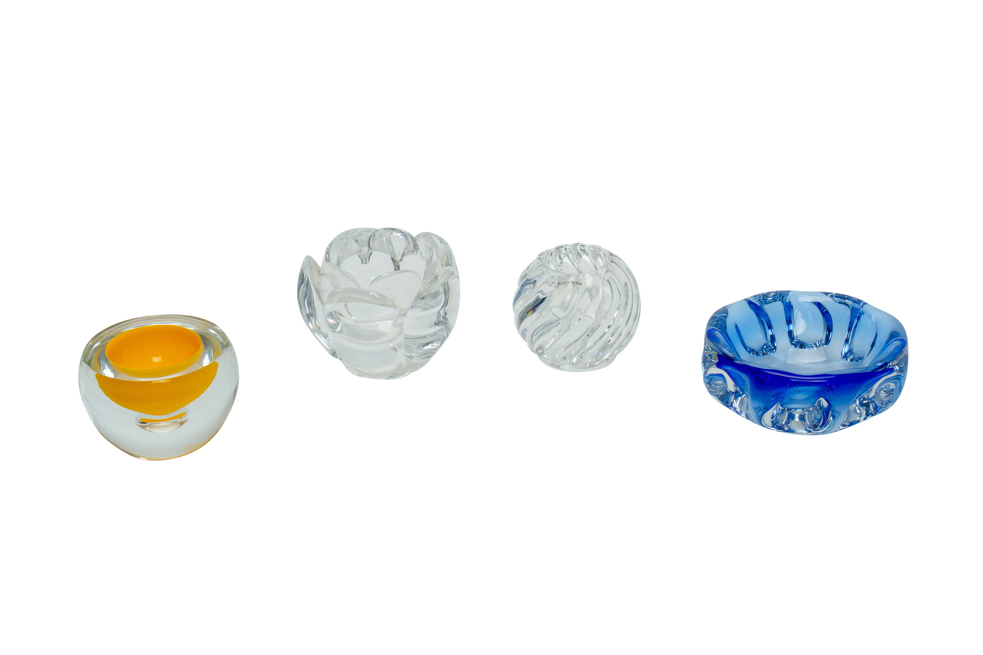 A GROUP OF FOUR STUDIO GLASS BOWLS AND CANDLE HOLDERS