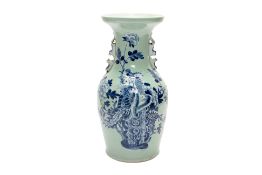 A BLUE AND WHITE CELADON GROUND BALUSTER VASE