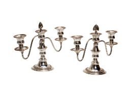 A PAIR OF ENGLISH SILVER PLATED THREE LIGHT CANDELABRA