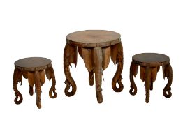 A SET OF THREE CARVED TEAK ELEPHANT TABLES