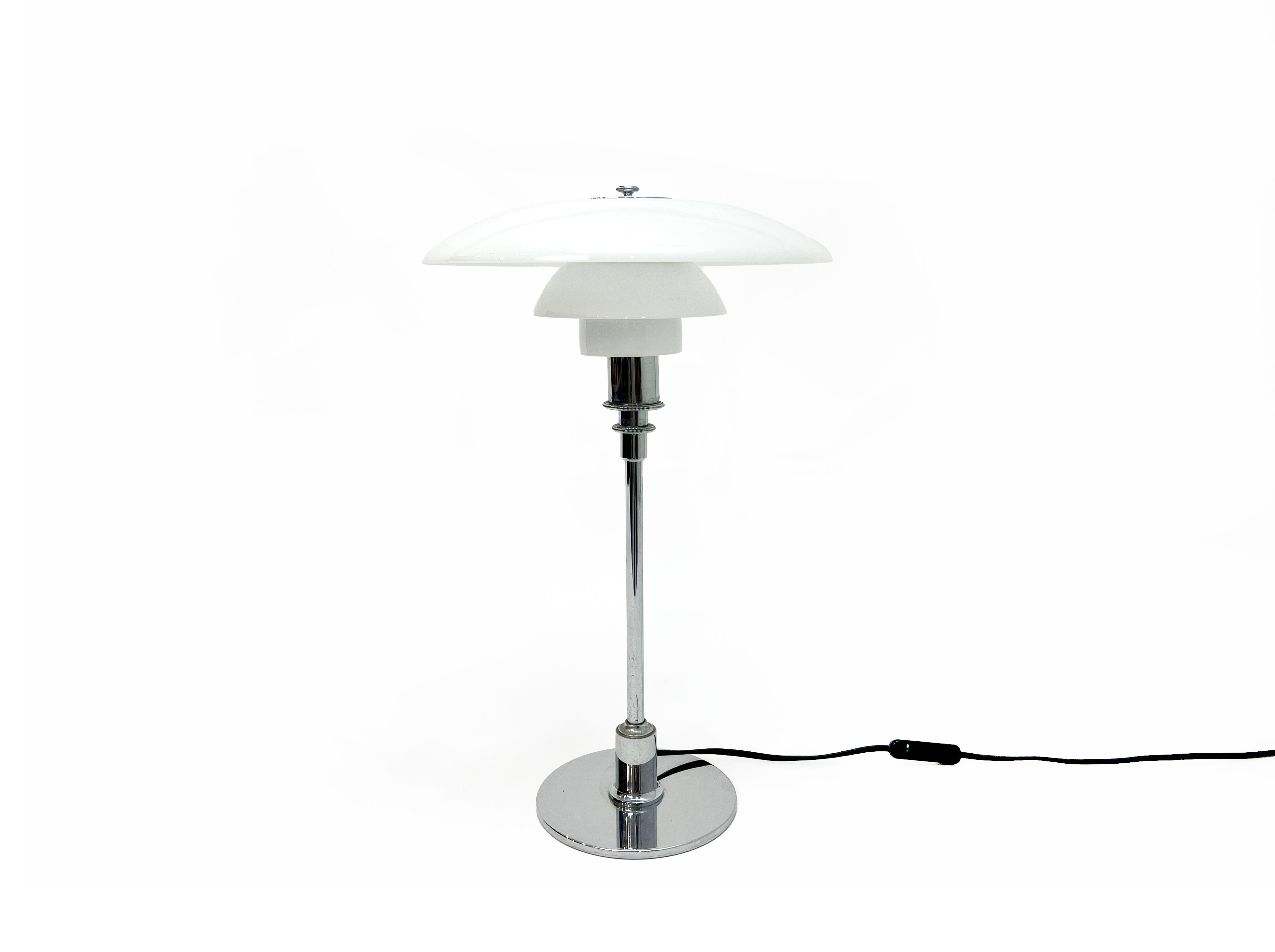 A LOUIS POULSON GLASS AND CHROME PLATED TABLE LAMP