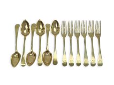 A SET OF ANTIQUE FRENCH SILVER GILT SPOONS AND FORKS