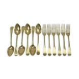 A SET OF ANTIQUE FRENCH SILVER GILT SPOONS AND FORKS