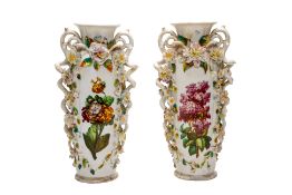 A PAIR OF LARGE EUROPEAN FLORAL ENCRUSTED PORCELAIN VASES