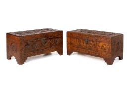 A PAIR OF CARVED WOOD CHESTS