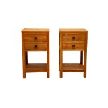 A PAIR OF TEAK SIDE TABLES