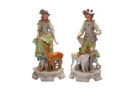 A PAIR OF LARGE FRENCH BISQUE PORCELAIN FIGURES