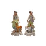 A PAIR OF LARGE FRENCH BISQUE PORCELAIN FIGURES