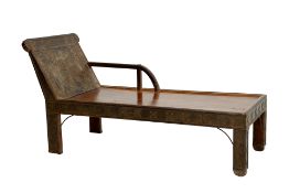 AN INDIAN METAL MOUNTED TEAK CHAISE LONGUE