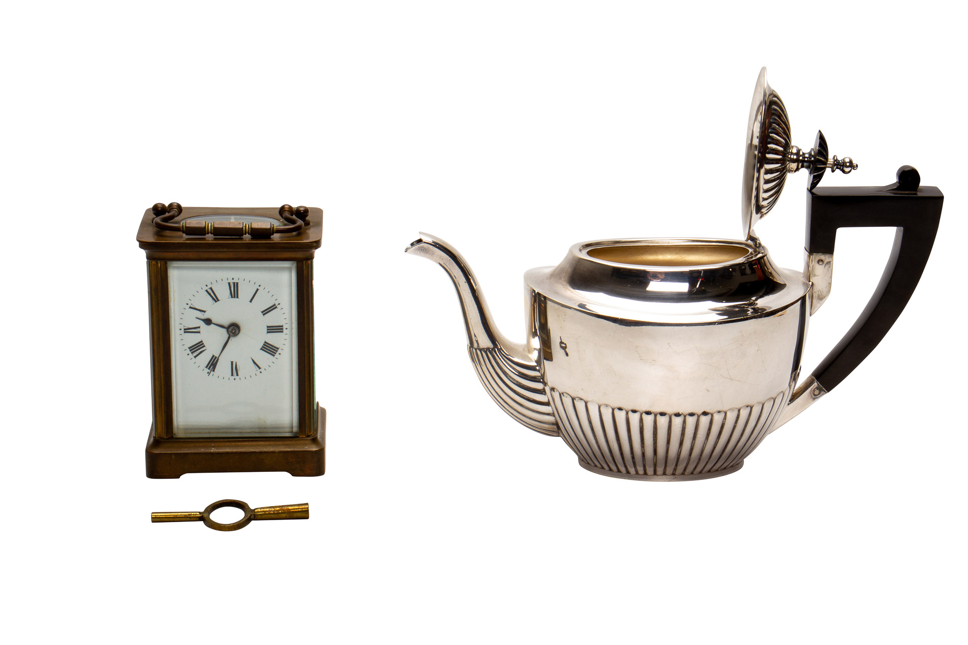 A BRASS FIVE GLASS CARRIAGE CLOCK AND A SILVER PLATED TEAPOT - Image 2 of 3